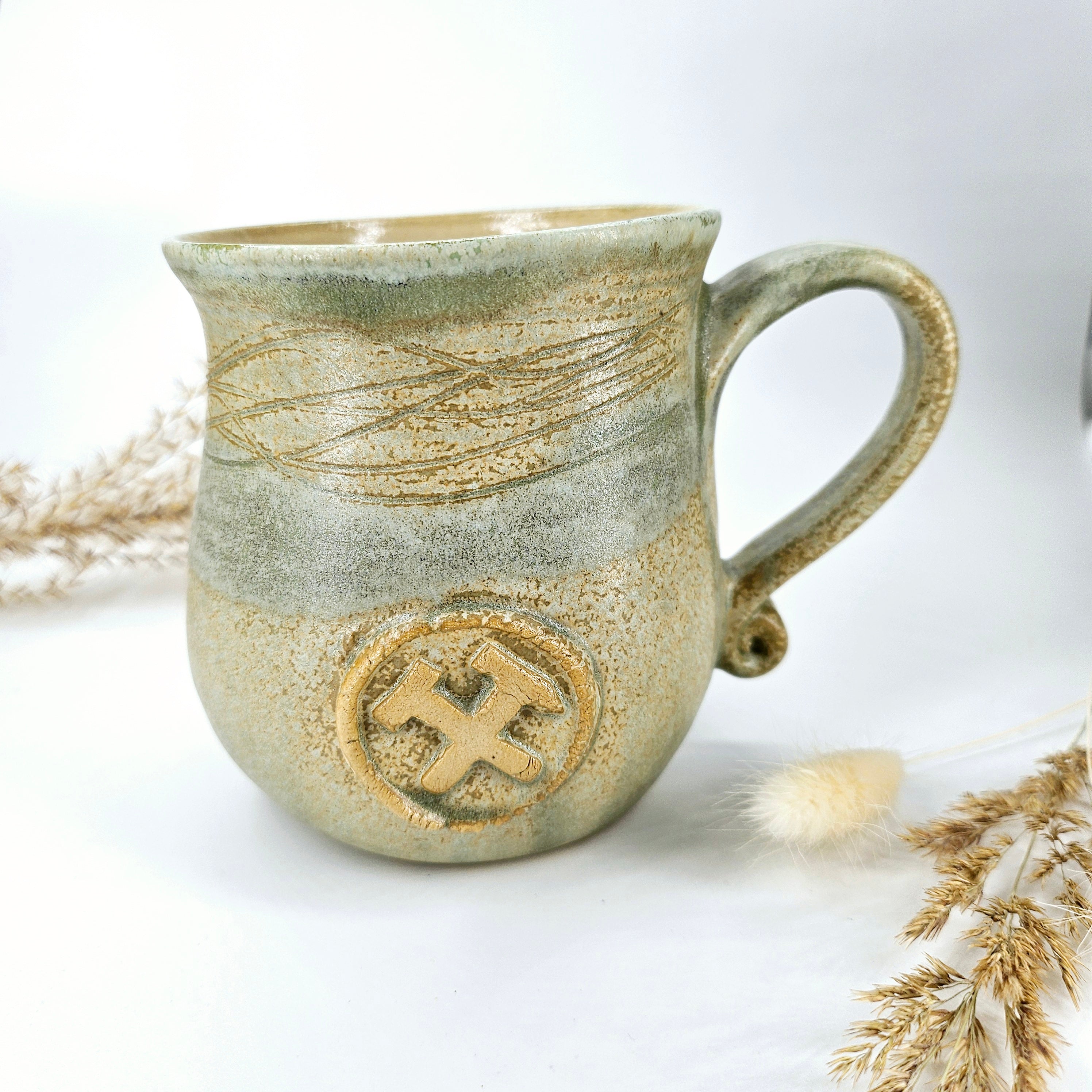 InspiraTON - Erz Steigertasse Eisen und Schlegel